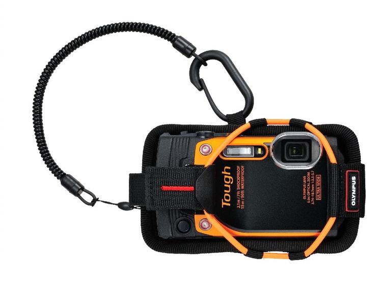 Sport Holder (CSCH-123) - zabezpiecza aparat, przytwierdzając go pewnie do uprzęży lub paska plecaka. Wyposażony jest w sprężynową linkę, karabinek i mechanizm szybkiego uwalniania, dające duża uniwersalność